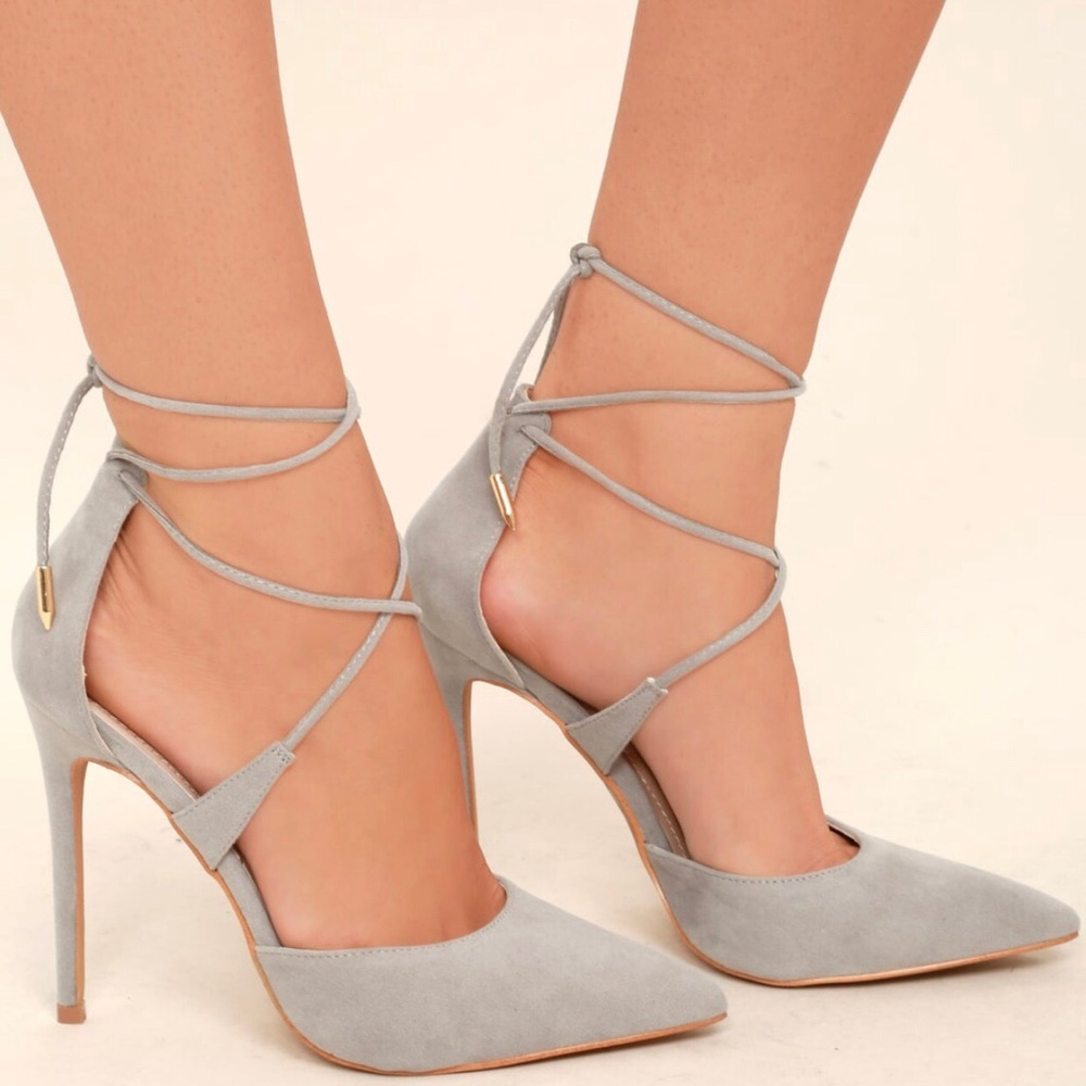 Brand new. Never worn. Grey Lace Up Heels
